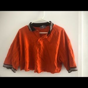 Orange cropped t shirt with checkered detailing